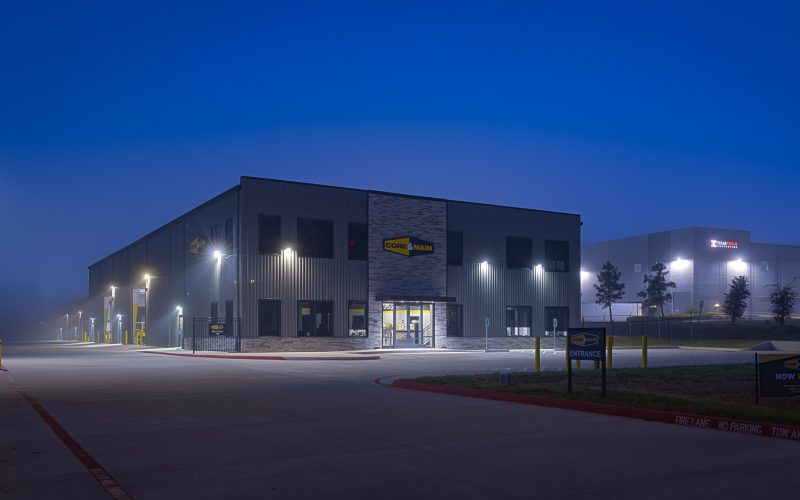 Photography documenting the completed CORE & Main industrial facility located in Conroe, Texas.
Commissioned by Rosenberger Construction to showcase the successful completion of a build-to-suit project designed to meet the specific operational requirements of CORE & Main, a leading distributor of water, sewer, storm drain, and fire protection products.
Images highlight architectural details, site layout, and construction quality as part of Rosenberger’s portfolio of industrial and commercial developments across Texas. Photographed by Mauricio Ramirez, Commercial and Industrial Photographer based in The Woodlands, Texas.